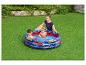 Piscine gonflable Spider-Man pour enfants dans un jardin.
