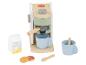 Ensemble de jouets en bois avec machine à café, tasses, carton de lait et grains de café.