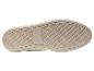 Semelles de chaussures blanches avec bord en jute.