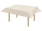 Nappe beige sur table en bois.