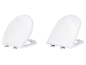 Deux abattants WC LIVARNO® en Duroplast blancs, formes O et D.