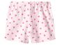 Short rose clair avec un motif intégral de petits cœurs roses.