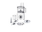 Un robot culinaire Bosch blanc avec des accessoires, notamment des lames et un disque.