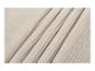 Texture de tissu en gaze de coton beige avec des plis