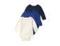 Trois bodys manches longues pour bébé en bleu marine, bleu clair et crème.