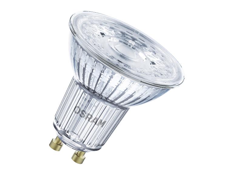 Une ampoule LED en verre avec culot GU10 et un design nervuré.