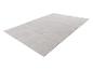 Tapis gris clair avec un motif géométrique de cercles et de demi-cercles.