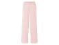 Pantalon rose pâle ample, style décontracté.