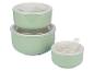 Trois bols verts avec des couvercles