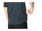 T-shirt de sport homme bleu foncé avec poche latérale zippée pour téléphone.