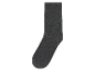 Une chaussette gris foncé sur fond blanc.