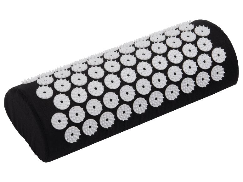 Coussin d'acupression noir avec picots blancs pour la relaxation et le soulagement de la douleur.