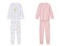 Deux pyjamas pour filles, l'un à imprimé licorne, l'autre à motif cœur.