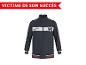 Veste de sport bleu foncé avec bande blanche et emblème, texte : « VICTIME DE SON SUCCÈS »