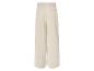 Pantalon blanc large avec élastique à la taille.