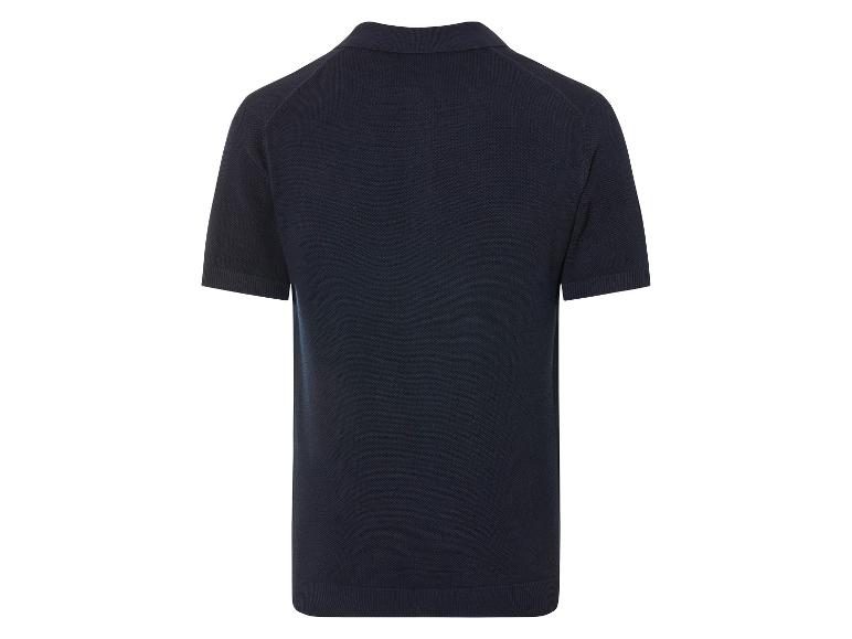 Polo en maille marine à manches courtes.