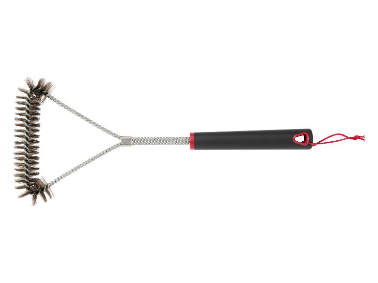 Une brosse à griller en fil métallique avec deux brosses et une poignée noire