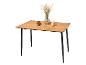 Table à manger en bois avec des pieds noirs, décorée d'un vase et de bougies.