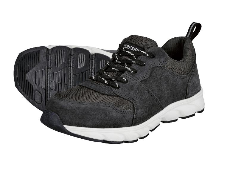 Baskets Parkside en daim gris foncé avec semelles blanches.