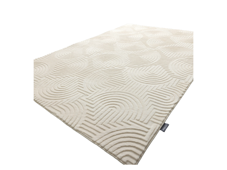 Tapis Megnaan Lace à motif géométrique crème.