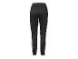 Pantalon de sport noir pour femme avec logo sur la jambe gauche.