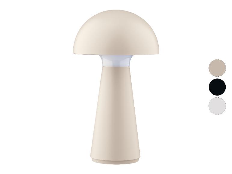 Une lampe de table beige en forme de champignon.
