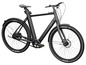 Un vélo électrique noir avec des pneus Kenda.
