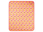 Une couverture de pique-nique rose avec un motif de citrons, pastèques et cerises.