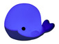 Une veilleuse bleue en forme de baleine.