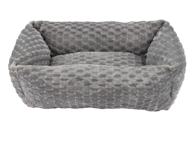 Lit gris et doux pour animaux de compagnie en tissu texturé.