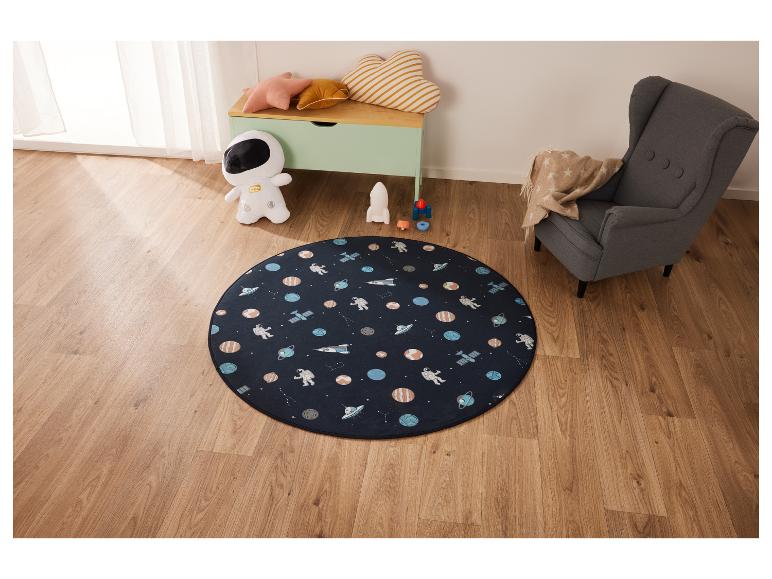 Tapis rond pour enfants sur le thème de l'espace.