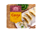 Gyoza de poulet de style asiatique, 400g, sur fond de bambou.