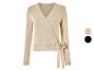 Pull en maille beige à col en V et nœud.
