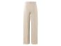 Pantalon large beige à taille haute.