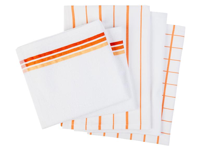 Serviettes de cuisine à rayures et à carreaux orange.