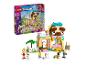Ensemble LEGO Friends Boutique d'Accessoires pour Animaux avec deux figurines, trois animaux et une boutique en forme de carlin.