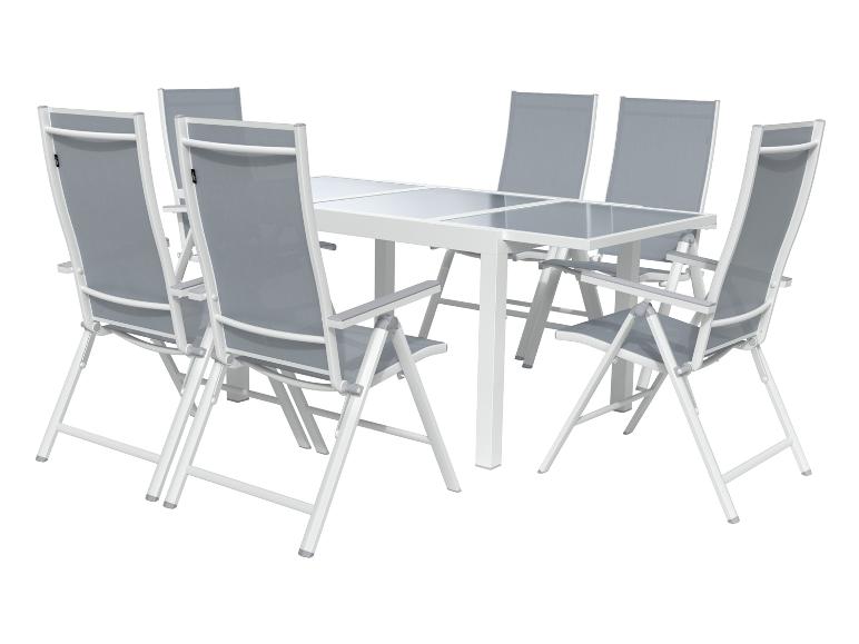 Table de jardin blanche avec chaises grises, ensemble repas extérieur.