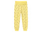 Pantalon de jogging jaune avec un motif de fraises.
