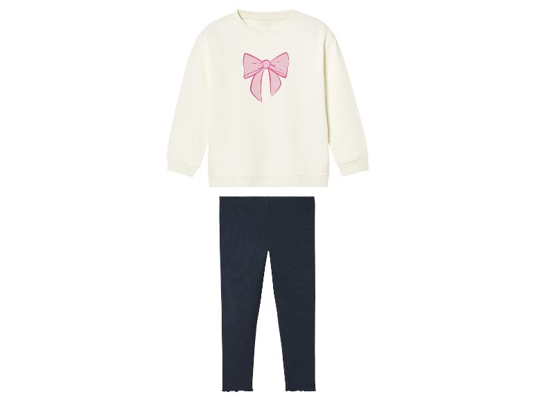 Sweat-shirt crème à nœud rose et leggings côtelés marine pour fille.