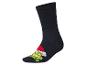Chaussettes noires avec le Grinch portant un bonnet de Père Noël