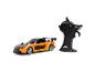 Voiture de course RC Fast & Furious orange et noire avec télécommande.