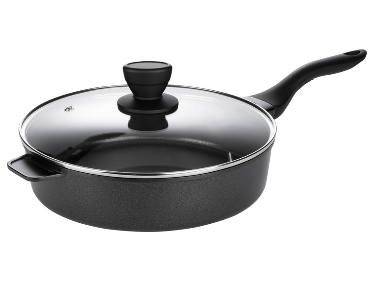 Une casserole noire avec un couvercle en verre.