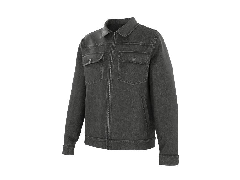 Une veste en jean noire avec une fermeture éclair.
