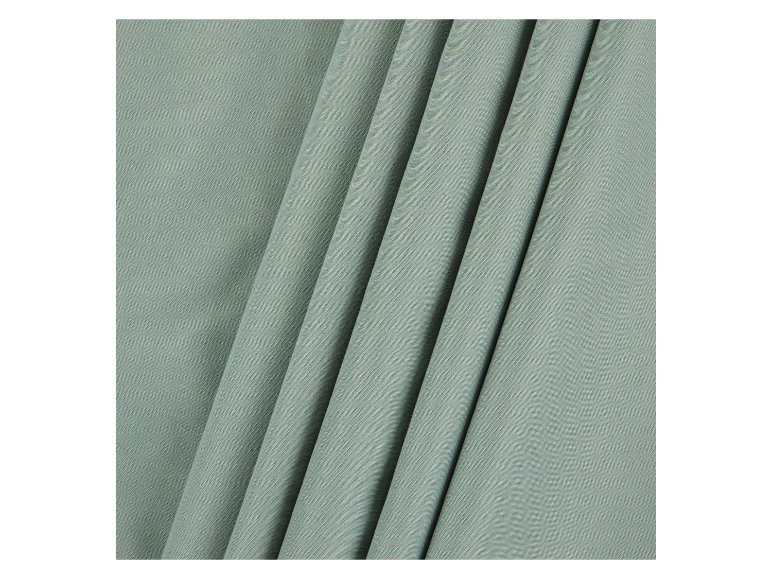 Tissu doux, vert clair, à texture fine.