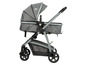 Une poussette BabyComfort grise avec une nacelle et un panier d'achat.