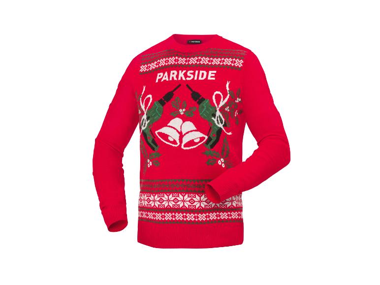 Pull de Noël rouge avec des motifs d'outils et de clochettes.
