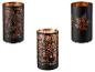 Trois bougeoirs noirs avec des détails en cuivre et différents motifs.