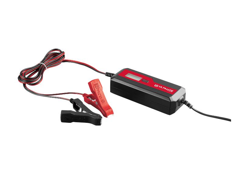 Chargeur de batterie avec pinces rouges et noires, écran rouge et boîtier noir.