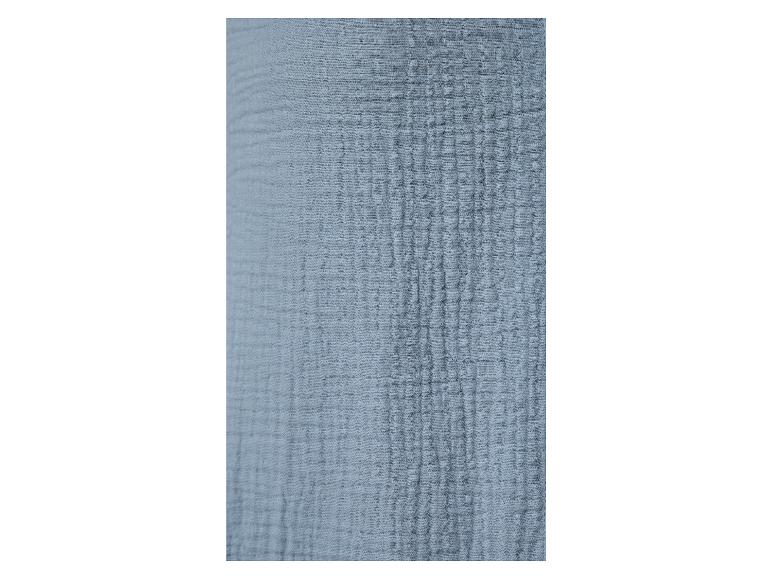 Texture d'un tissu en coton bleu.