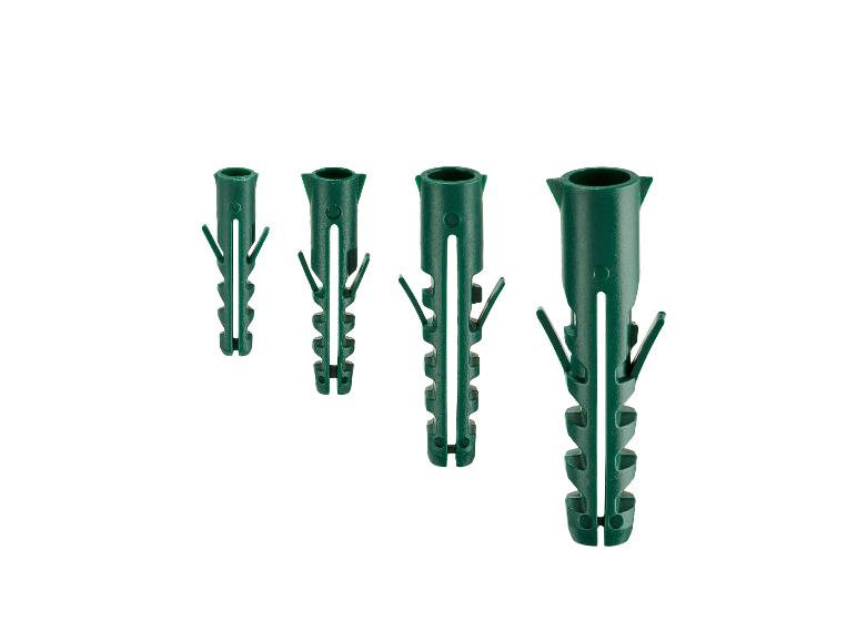 Quatre chevilles en plastique vertes de différentes tailles, disposées en diagonale.